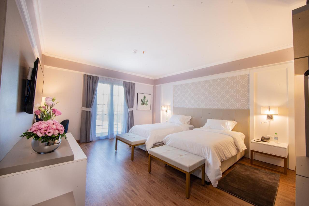 Bisinii Boutique Hotel Сиудад дел Есте Екстериор снимка
