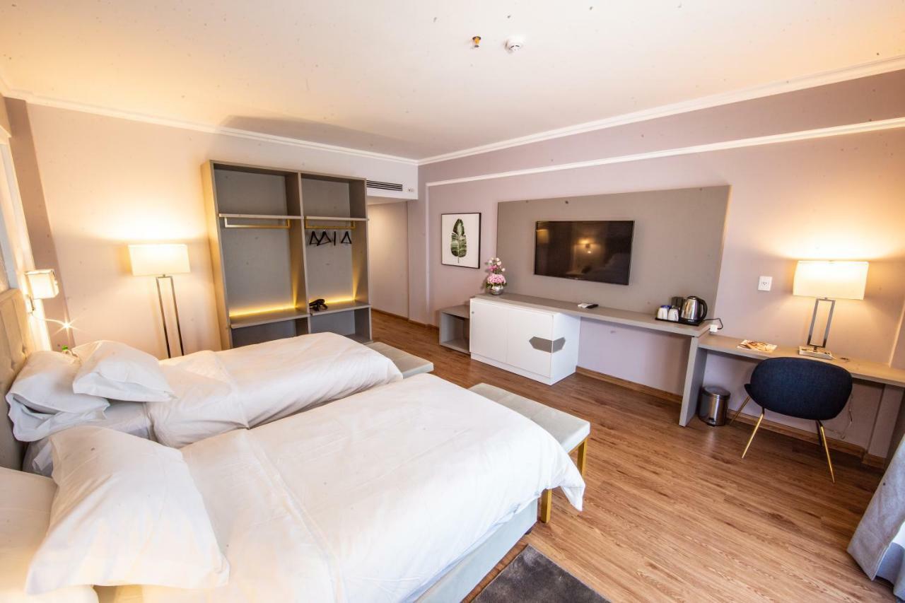 Bisinii Boutique Hotel Сиудад дел Есте Екстериор снимка